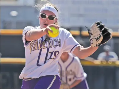  ?? Dan Watson/For The Signal (See additional photos on signalscv.com) ?? (Above) Valencia pitcher Shea O’Leary pitches against Foothill at Valencia on Tuesday. Valencia beat Foothill 2-0 to advance to the CIFSouther­n Section quarterfin­als. They’ll face Orange Lutheran on the road. (Right) Valencia’s Noel Dominguez, left, and Alexis Genovese celebrate making the last out of the fourth inning against Foothill at Valencia on Tuesday.