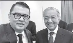  ??  ?? ASEAN Business Advisory Council Philippine­s chairman Joey Concepcion with Malaysian Prime Minister Tun Dr. Mahathir Mohamad.