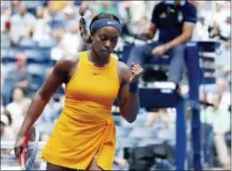  ?? JASON DECROW — THE ASSOCIATED PRESS ?? Sloane Stephens pumps her fist after winning a shot to against Victoria Azarenka, of Belarus, during the third round of the U.S. Open tennis tournament, Friday in New York.