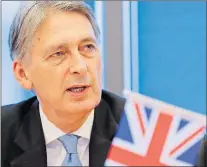  ?? AP PHOTO ?? U.K. Chancellor of the Exchequer Philip Hammond attends the U.K.-China High Level Financial Services Roundtable Friday at the Bank of China head office building in Beijing, China.