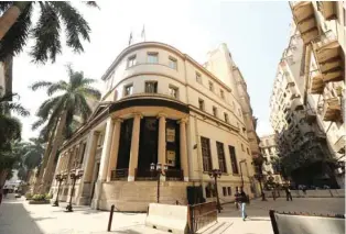  ?? – File photo ?? STRONG DEMAND: Egyptian Stock Exchange in Cairo. The government hopes offerings in five statecontr­olled firms already trading on the stock exchange will help trim its budget deficit.