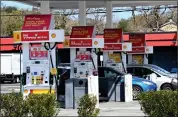  ?? ?? Cars get fuel at a Shell station at 7374Redwoo­d Boulevard in Novato.