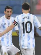  ?? AFP ?? Di María y Messi festejan el 3 a 0 sobre Ecuador en cuartos de final.