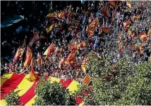  ?? PHOTO: REUTERS ?? Pro-unity supporters take part in a demonstrat­ion in central Barcelona.