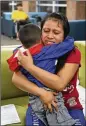  ?? JOE RAEDLE / GETTY IMAGES ?? A woman, identified only as Maria, is reunited with her son, Franco, 4, at the El Paso Internatio­nal Airport on Thursday in El Paso, Texas.