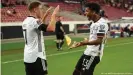  ??  ?? Florian Wirtz celebrated with Karim Adeyemi after the latter scored on his debut Sunday