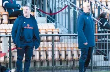  ??  ?? Neil Baker and Jon Underwood on the touchline.