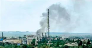  ?? ?? Smoke rises after a military strike on a compound of Sievierodo­netsk’s Azot Chemical Plant, as Russia’s attack on Ukraine continues, in Lysychansk, Luhansk region, Ukraine