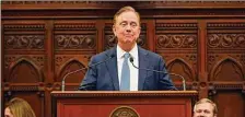  ?? Associated Press ?? Gov. Ned Lamont delivers the State of the State address during the opening session of the Legislatur­e last month.