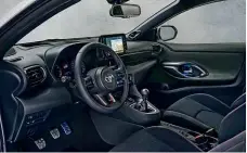  ??  ?? BUSINESS
Cabin looks reserved, but sports seats, chunky wheel and manual gearlever give clues to GR Yaris’ potential