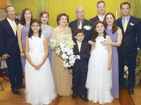  ??  ?? Betina and Chito Legarda celebrate their 50th wedding anniversar­y with their family Tono, Ces, Tina Javy, Celso, Anya, Paolo, Alexa and Janina. She wears a gown by New Yorker.