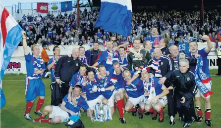  ??  ?? All-ireland champions:
Linfield players and officials celebrate their defeat of Shelbourne in the 2005 Setanta Cup final