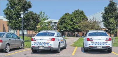  ?? ERIC MCCARTHY/JOURNAL PIONEER ?? RCMP rushed to Westisle Composite High School at noon on Friday after receiving a report of a potential threat involving a firearm. A lockdown was imposed but was subsequent­ly lifted after the school, including lockers, was checked and deemed safe....