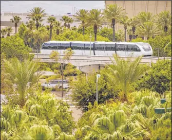  ?? L.E. Baskow Las Vegas Review-Journal @Left_Eye_Images ?? The Las Vegas Monorail can drop off convention­eers on the Las Vegas Convention Center doorstep. Train ads could be in play to become an LVCVA revenue source.