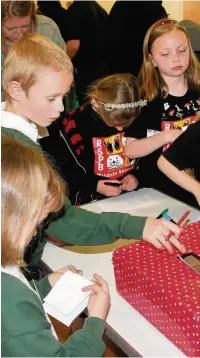  ??  ?? ●» Youngsters enjoy themselves at the Macclesfie­ld RSPB Wildlife Explorers meeting