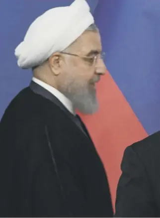  ?? ?? Russian President Vladimir Putin meets former Iranian President Hassan