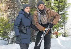  ?? FOTO: WILD BUNCH GERMANY ?? Cory Lambert (Jeremy Renner) und Jane Banner (Elizabeth Olsen) suchen im Film „Wind River“einen Mörder.