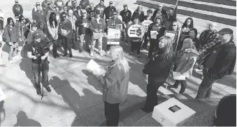  ?? JASON KRYK ?? Terry Weymouth, Unifor’s national skilled trades co-ordinator, speaks at Charles Clark Square Wednesday during an event to mark Equal Pay Day on the anniversar­y of women’s suffrage in Canada.