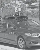  ?? UBER/AFP/GETTY IMAGES ?? Testing self-driving car in 2016.