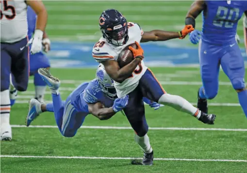  ?? AP ?? Tarik Cohen, who ran more forcefully in the opener against the Lions, had seven carries for 41 yards (5.9-yard average) and didn’t lose any yards.
