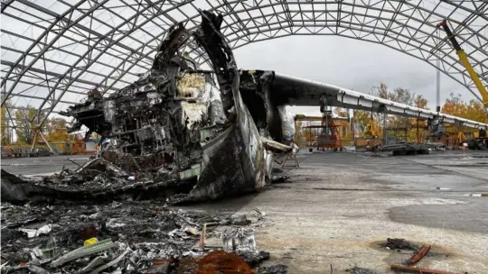  ?? ?? The wreck of the Antonov AN-225 Mriya — once the world’s largest cargo airplane, destroyed during fighting between Russian and Ukrainian forces in late February. Antonov Airport employees vowed to build a new, upgraded Mriya to replace the one that was ruined.