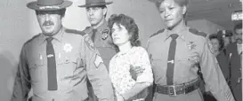  ?? HANDSCHUH/AP 1981 ?? Kathy Boudin is led by sheriff’s officers from Rockland County Courthouse in New City, New York.