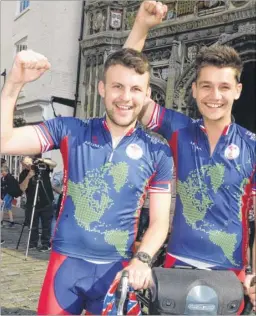  ?? Picture: Chris Davey FM4372590 ?? George Aghate and John Whybrow about to leave Canterbury on their eight-month round-the-world tandem ride for charity