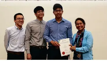  ??  ?? Tengku Nasariah (right) awarding Team Drop the Stick – winner of Gerontechn­ology Challenge 2018 – a certificat­e from Petrosains.