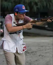  ?? Haley Sawyer/The Signal ?? Evan Birken fires at a clay target at Oak Ridge Gun Club on Wednesday, Sept. 11.