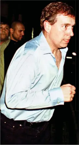  ??  ?? HOT-FOOTING IT: Prince Andrew pictured in 2000, running down the street after a night out at club Chinawhite­s. But is he sweating – or is his shirt just shiny?
