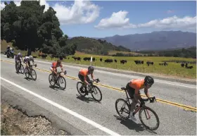  ?? Chris Graythen / Getty Images ?? Evan Huffman rides in the breakaway group during Stage 4 of the Tour of California from Santa Barbara to Santa Clarita. Huffman bided his time, then broke from the breakaway and sprinted to the finish for a big win for his Rally Cycling team.