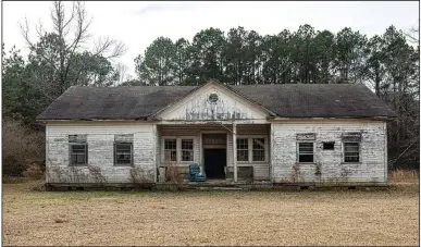  ?? (Arkansas Democrat-Gazette/Cary Jenkins) ?? The Mt. Olive Rosenwald School, on Bradley Road 45 in Mt. Olive in Bradley County, is a wood-frame Colonial Revival schoolhous­e built in 1927. The school once enjoyed a renewal as a community center, but has long been vacant and is now in a state of serious decay.