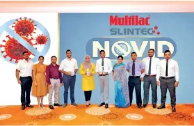  ??  ?? SLINTEC and Multilac Care teams during NOVID antiviral and antibacter­ial spray launch