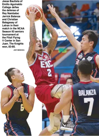  ?? JoEy MENdozA ?? Jesse Bautista of Emilio Aguinaldo College defies the defense of Rey Nambatac Jerrick Balanza and Christian Balagasay of Letran in their match in the NCAA Season 93 seniors tournament at the Filoil Flying V Center in San Juan. The Knights won, 83-80.