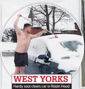  ??  ?? WEST YORKS Hardy soul clears car in Robin Hood