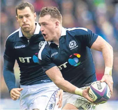  ?? Pictures: SNS Group/Getty Images. ?? Left: Tommy Seymour goes in for Scotland’s opening try despite the efforts of Scott Williams; above: in-form full-back Stuart Hogg makes another break; below: Ali Price celebrates at the final whistle with Alex Dunbar.