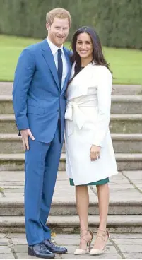  ??  ?? For the engagement photo call, Meghan wore a coat by Line The Label that sold out fast after it was seen online, prompting the Canadian brand to name it “The Meghan.”