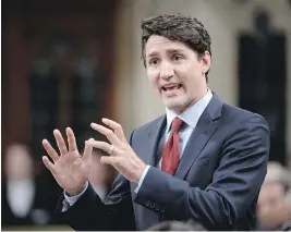  ?? ADRIAN WYLD / THE CANADIAN PRESS ?? Prime Minister Justin Trudeau speaks during the last question period of the session on Wednesday. Polling numbers for the Liberals are down as the summer break begins.