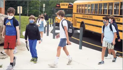  ?? Ned Gerard / Hearst Connecticu­t Media file photo ?? Students arrive for the first day of classes at Coleytown Middle School on Aug. 31.