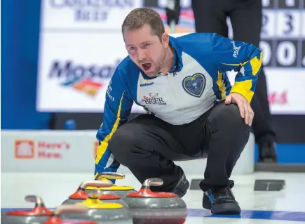  ?? CP PHOTO ?? B.C. skip Sean Geall directs his sweepers during a Monday night game against Yukon at the Tim Hortons Brier in Regina. Yukon won 8-2 and left B.C. with a 0-4 record.