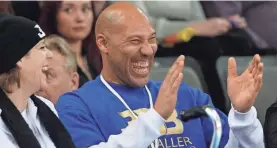  ?? LIUSJENAS KULBIS/AP ?? LaVar Ball watches his sons play in Lithuania on Jan. 9.