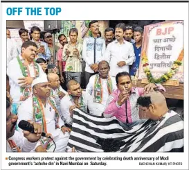  ??  ?? Congress workers protest against the government by celebratin­g death anniversar­y of Modi government’s ‘achche din’ in Navi Mumbai on Saturday. BACHCHAN KUMAR/ HT PHOTO