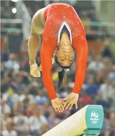  ??  ?? US gymnast Simone Biles competes in the women’s balance beam event final of the Artistic Gymnastics at the Olympic Arena during the Rio 2016 Olympic Games in Rio de Janeiro. — Reuters photo