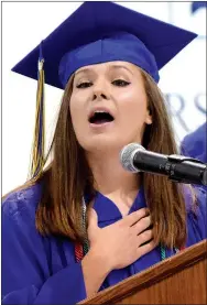  ?? Photo by Mike Eckels ?? Meagan Smith led her fellow graduates, family and guests in the Pledge of Allegiance during the opening of the 2017 Decatur High School Graduation ceremony.