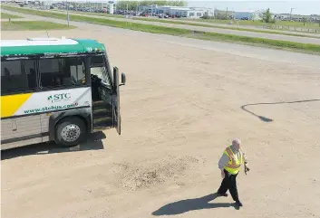  ??  ?? Walter Kacuiba, who has been with STC since 2005, is one of the 220 STC bus drivers.