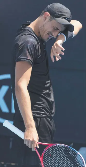  ?? Picture: MICHAEL KLEIN ?? Tennis star Bernard Tomic shows signs of frustratio­n during his Australian Open qualifying round loss to Lorenzo Sonego.