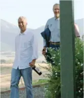  ?? DAVID S. LEWIS/MONTANA PIONEER ?? Rahm Emanuel and Bruce Rauner in happier times outside the Paradise Valley Grill near Livingston, Montana, in 2010.