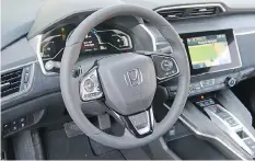  ??  ?? The interior of the Honda Clarity is simple, elegant and uncluttere­d.