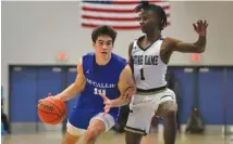  ?? STAFF PHOTO BY OLIVIA ROSS ?? McCallie’s Parker Robison (10) dribbles upcourt followed by Notre Dame’s Braylon Hammond during Saturday’s semifinal matchup.