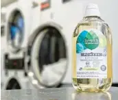  ?? DAMIAN DOVARGANES/AP ?? Seventh Generation is among a growing number of firms concentrat­ing their detergent or soap in order to make the bulky plastic containers smaller.